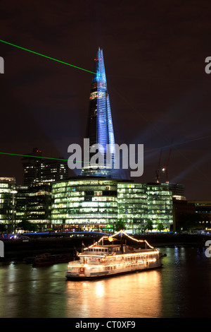 Inauguration laser light show for The Shard. Beaming across the skyline and illuminating the tallest skyscraper in London. Stock Photo