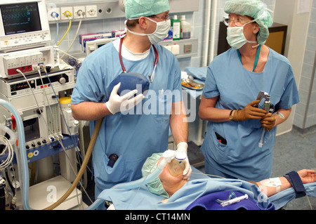 Anesthesiology at induction of anesthesia in the operating room Stock Photo