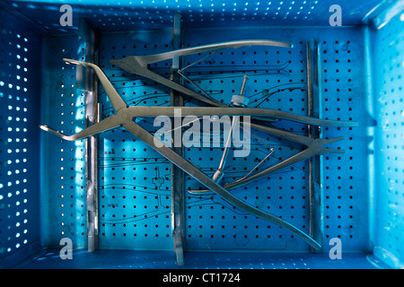 Various surgical hand tools in crate. Stock Photo