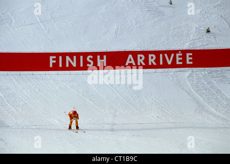 Skier arrives at the finish line. Stock Photo