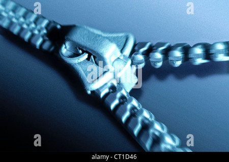 zipper half closed as a synonym for integration Stock Photo