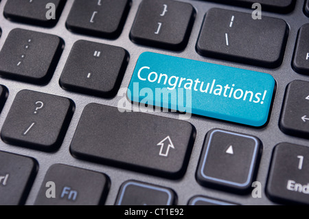 a congratulations message on enter key of keyboard. Stock Photo