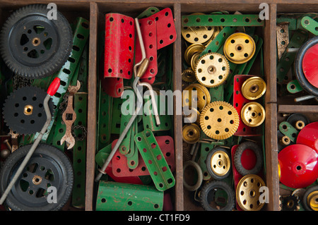 Box of Meccano construction set parts Stock Photo
