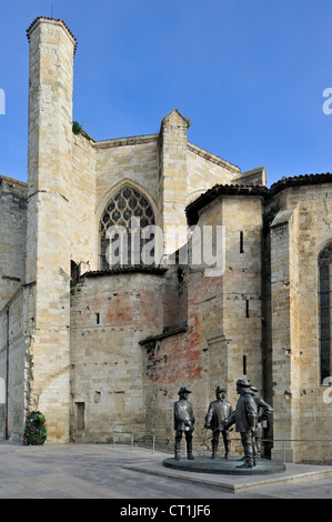 Statue of d'Artagnan and The Three Musketeers in front of the cathedral at Condom, Midi-Pyrénées, Pyrenees, France Stock Photo