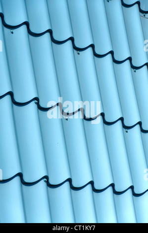Vertical ridged blue painted metal wall texture Stock Photo