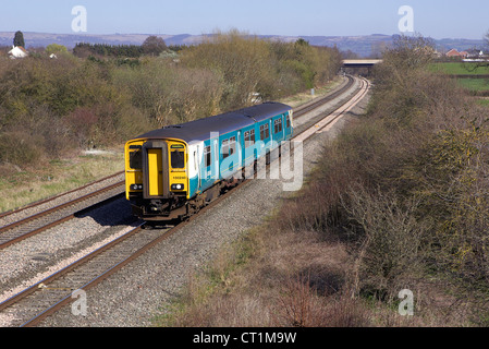 ATW 150240 heads through Badeworth, Cheltenham with a Cheltenham - Maesteg service on 26/03/12. Stock Photo