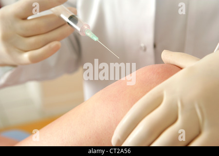 KNEE, INFILTRATION Stock Photo