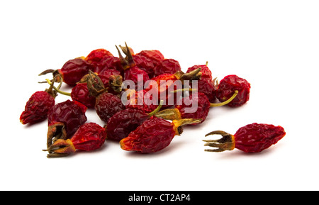 Pile of dried rose hips isolated on white Stock Photo