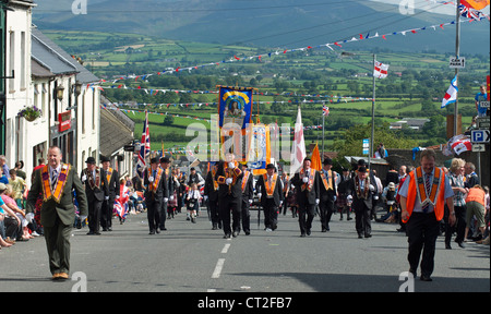 12th July, 2011. Rathfriland, Northern Ireland, UK. Orangemen march up the hill to Rathfriland, Northern Ireland. Stock Photo