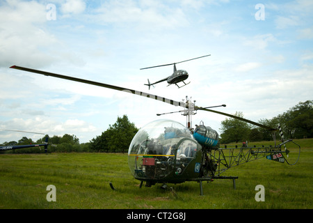Westland Sioux AH1 Helicopters flying at the Cholmondeley Castle Pageant of Power 2012, CHESHIRE Stock Photo
