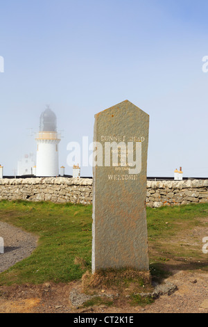 Stone welcome sign for Dunnet Head lighthouse in mist at most northerly point of mainland Britain. Dunnet Caithness Scotland UK Stock Photo