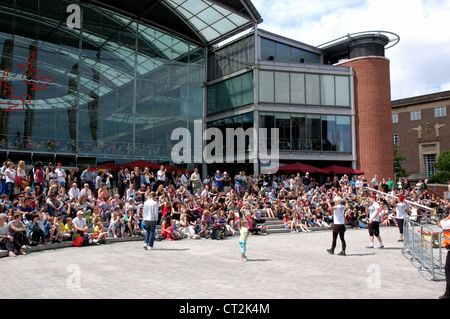 Outdoor entertainment on Millennium Plain, in front of the Forum, Norwich, Norfolk, UK Stock Photo