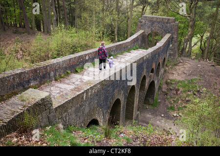 Stone bridge folly in Lever Park at Rivington, Lancashire. The park was originally constructed for Lord Leverhume Stock Photo