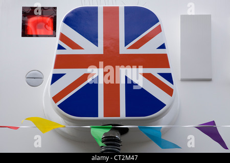 Giant wall socket and plug in Ganton street off London's Carnaby street Union Jack Stock Photo