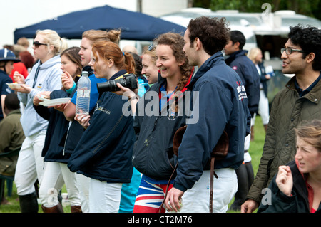 Students watching polo match Stock Photo