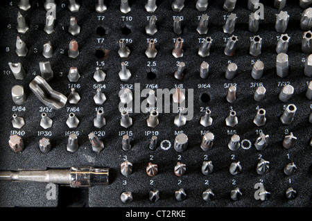 Different bits in a aluminium case photographed from the side Stock Photo