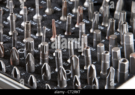 Different bits in a aluminium case photographed from the side Stock Photo