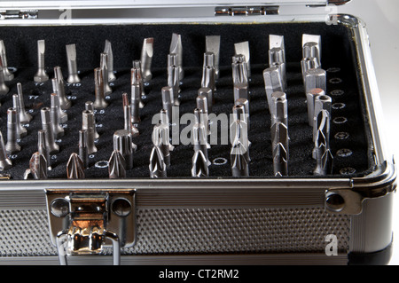 Different bits in a aluminium case photographed from the side Stock Photo