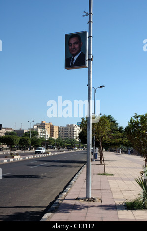 Portrait of Egyptian President Hosni Mubarak, six years before he was deposed, on a lamp post in Aswan, Egypt Stock Photo