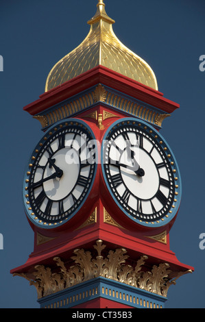 The freshly painted victorian Jubilee clock tower on Weymouth seafront was erected in 1887 to mark fifty years of Queen Victoria’s reign. Dorset, UK. Stock Photo