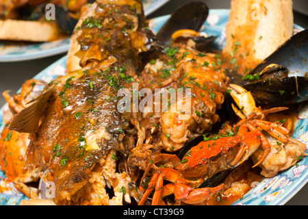 Italian Seafood Soup with mussels and clams. Stock Photo