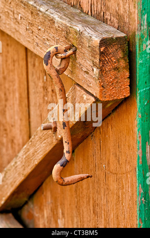 on wooden doors the old lock hook close-up Stock Photo