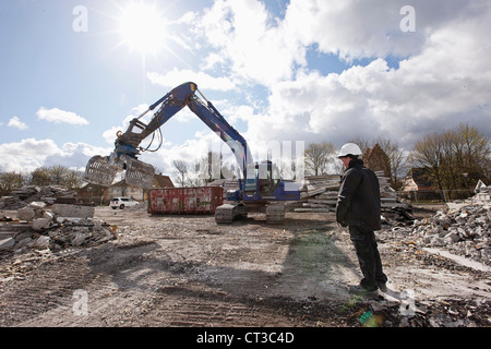 Worker standing on construction site Stock Photo