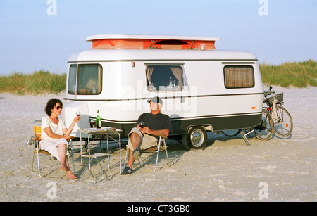 Prerow pair before caravan on camping on the Baltic Sea Stock Photo