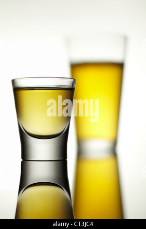 Close up of shot glass with liquid Stock Photo