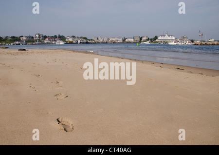 Rhode Island, Block Island. Beach view of harbor area of New Shoreham. Footprints in the sand. Stock Photo
