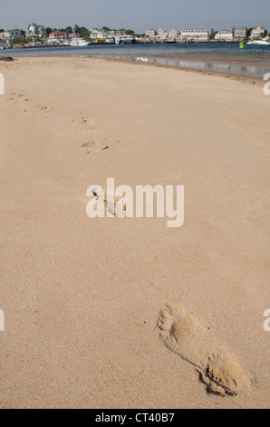 Rhode Island, Block Island. Beach view of harbor area of New Shoreham. Footprints in the sand. Stock Photo