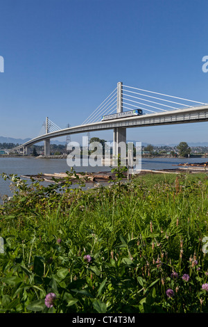 North Arm Canada Line skytrain bridge over the Fraser river between Richmond and Vancouver. Stock Photo