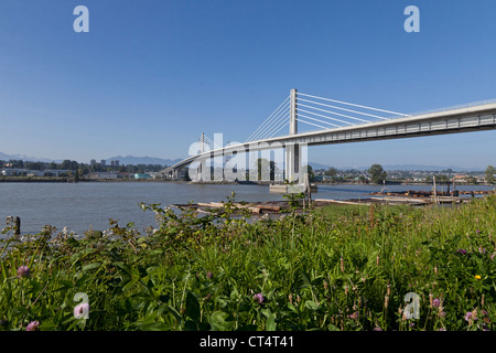 North Arm Canada Line skytrain bridge over the Fraser river between Richmond and Vancouver. Stock Photo