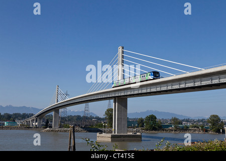 North Arm Canada Line skytrain bridge over the Fraser river between Richmond and Vancouver. Stock Photo