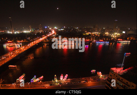 Night scene of River Nile in Cairo showing 6 October bridge Stock Photo