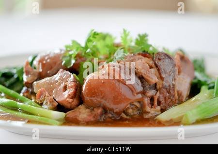 chinese food , stewed pork knuckle with kale inside Stock Photo