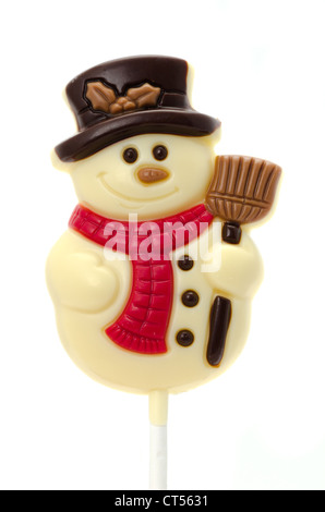 White chocolate Christmas snowman lolly - studio shot with a white background Stock Photo