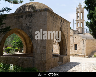 dh Agia Napa Monastery AYIA NAPA CYPRUS Venetian monastery fountain house well and Orthodox church bell tower greek Stock Photo