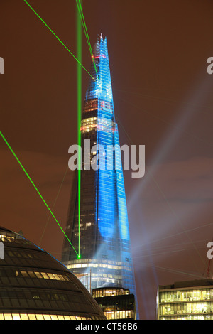 The highest building in Europe, The Shard, in London lit up with Lazer lights to celebrate its opening Stock Photo