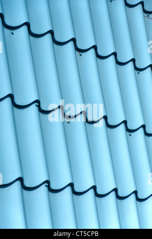 Vertical ridged blue painted metal wall texture Stock Photo