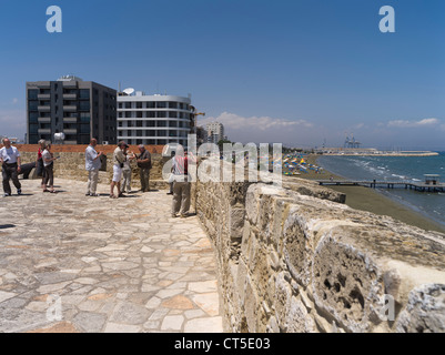 dh Larnaca fort LARNACA CYPRUS Tourist viewing seafront Larnaka fort Turkish battlement walls castle view tourists attractions tourism Stock Photo