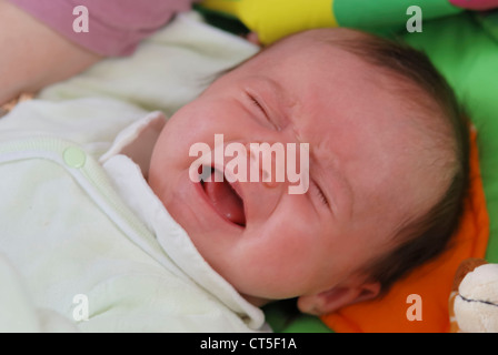 CRYING NEWBORN BABY Stock Photo