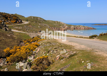 Single track road on North and West Highlands North Coast 500 Tourist Route along A838 by Ceannabeinne beach in Sutherland Highland Scotland UK Stock Photo
