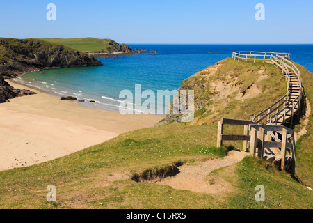 Wooden steps to viewpoint overlooking sandy beach and blue sea on scenic Scottish north coast 500 route at Sango Bay Sutherland Scotland UK Britain Stock Photo