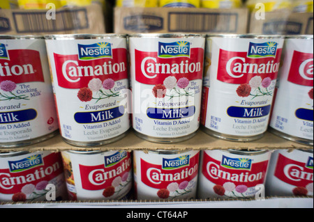 Cans of Nestle Foods product, Carnation Evaporated Milk Stock Photo