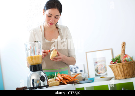 WOMAN IN KITCHEN Stock Photo