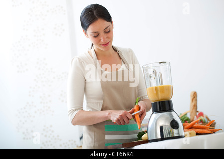 WOMAN IN KITCHEN Stock Photo