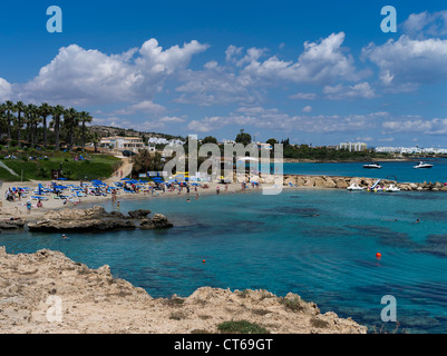 dh Loumbardi Bay PROTARAS CYPRUS Sandy beach sunbathers and swimmers Stock Photo