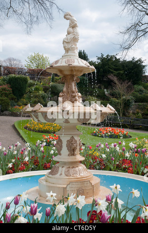 Fountain in the sunken formal garden known as The Dingle, within The Quarry Park on the bank of the River Severn at Shrewsbury Stock Photo