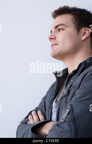 Thoughtful young man isolated on white background Stock Photo